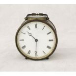 A brass alarm clock marked KB - glass cracked but no damage to dial