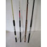 A collection of four fishing rods including Shakespeare, a Sealey "Sea Wolf" sea rod and a Chevron