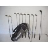 A set of Ryder Golf Clubs, including a Heel Toe no. 2 precision wedge, a sand and pitching wedge,