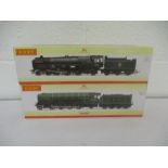 Two boxed Hornby OO gauge locomotives with tenders including the "Clan Buchanan" R2846 Standard