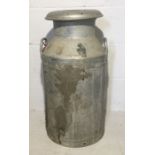 A two handled milk churn stamped "Torrington"