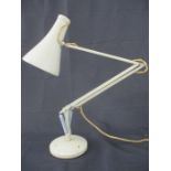 A cream Anglepoise lamp
