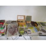 A large collection of fly tying materials.