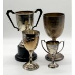 Two hallmarked silver trophies with local interest (weight 145.7g) along with two EPNS trophies