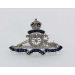 An enamelled Royal Artillery 18ct white gold sweetheart brooch set with diamonds, total weight 7.9g