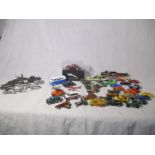 A collection of die cast and other vehicles including various lead ships, Hot Wheels etc.