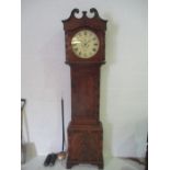 A mahogany long case clock, the round painted dial named to J W Hancock, Yeovil