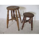 Two vintage wooden stools