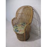 A vintage Peacock Chair. ( A/F)