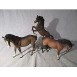 A Beswick rearing horse ( 1014) along with two other Beswick horses