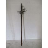 A reproduction sword, fullered blade with basket hilt