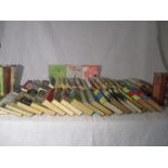 A collection of vintage hardback books many with dust covers