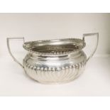 A hallmarked silver two handled sugar bowl, weight 295.2g ( 9.49 troy ounces)