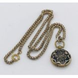 An "In Memory Of" Victorian locket ( tested as 14ct gold) on a tested 9ct gold chain, total weight