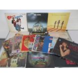 A small collection of 12" vinyl records including The Animals, ABBA, The Shadows, The Monkees,