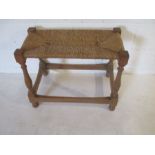 An Arts & Crafts rush seated stool
