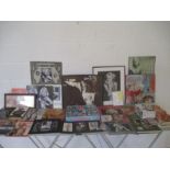 A large collection of Marilyn Monroe memorabilia including books, pictures, dvd's, cd's a jigsaw