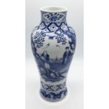 A Chinese blue and white vase decorated with traditional scenes of Scholars in a garden, four