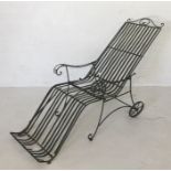 A large wrought iron garden chair A/F