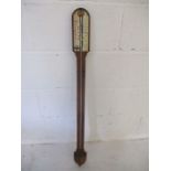 A stick barometer with thermometer to side by Tritschler & Co, Carlisle.