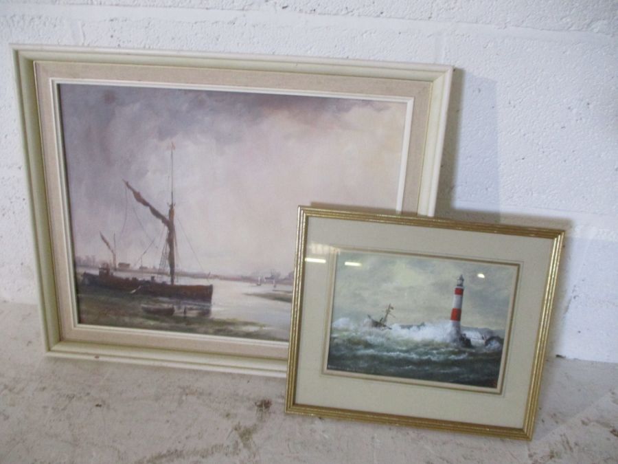 A watercolour of "Wreck on the Welsh Coast" by Stephen Chapman along with an oil of a harbour