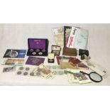 A collection of various coins, banknotes and other assorted items including "The Coinage of Great
