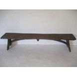 An Arts & Crafts rustic bench - overall width 188cm, depth 28cm, height 42cm