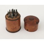 A Watchmakers set of tools in treen case, height 6.5cm