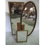 Two wall hanging mirrors and one other