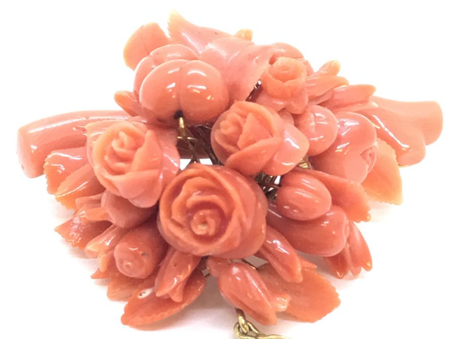 A Victorian coral brooch with gold coloured mount ( tested as 15ct) carved with roses and foliage, - Image 3 of 4