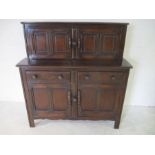 An Ercol dark wood Court Cupboard/ sideboard