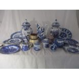 A collection of mainly blue and white china to include large pair of Willow pattern jars and covers,