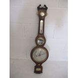 A mahogany cased Masonic barometer signed Schalfino, Taunton. Masonic symbols to the silvered face.