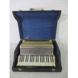 A Sivori Italian piano accordion in case