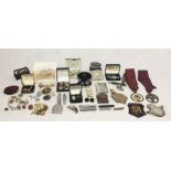 A collection of various items including penknives, lighters, cufflinks etc.