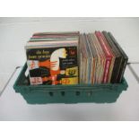 A collection of 12" vinyl records including classical. opera, musicals, soundtrack etc