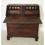 A four draw bureau with replacement ply back