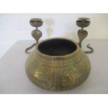 A Middle Eastern brass bowl, plus two candlesticks in the form of Cobra's.