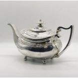 A hallmarked Georgian silver tea pot, weight 670.4g,(21.56 troy ounces) London 1815 by Solomon