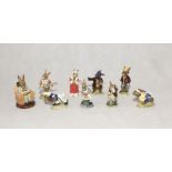 A collection of Royal Doulton Bunnykins including, "Master Potter Bunnykins", "Touchdown Bunnykins",