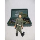 A Mintex Action Man, along with accessories including weapons, clothing, ammo box etc