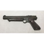 A Crosman Medalist II model 1300 .22 calibre air pistol, marbled fitted Bakelite grips