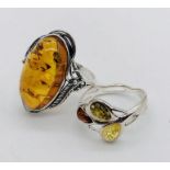 A 925 silver and amber ring along with one other