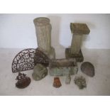 A collection of concrete garden ornaments included a bird bath, trough, pillar, gnome etc