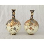 A pair of Royal Crown Derby globular vases with long flared necks in the Imari palette with Oriental