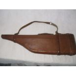 A vintage leather "leg of mutton" gun case