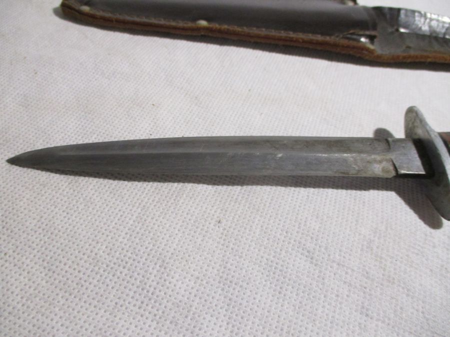 An Underhill & Co. knife in leather sheath along with a Commando style dagger( possibly by William - Image 9 of 10
