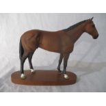 A Beswick Connoisseur figurine, Nijinsky, 1970 Winner of the Triple Crown, supported on an oval