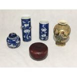 A collection of Oriental pottery including two Chinese blue and white vases with four character