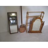 A toilet mirror plus one other, a towel rail and a copper bed warming pan.